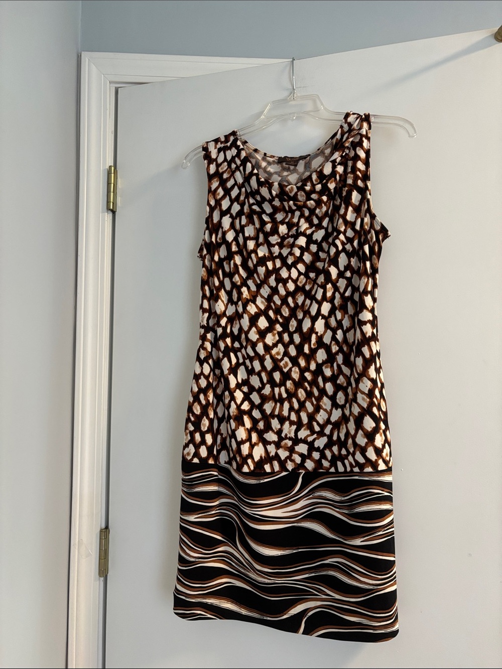 Victor Alfaro dress with animal-print pattern with a wavy-striped hem.